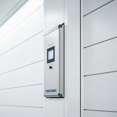 High-tech termite monitoring device installed in a commercial building, clean and modern aesthetic